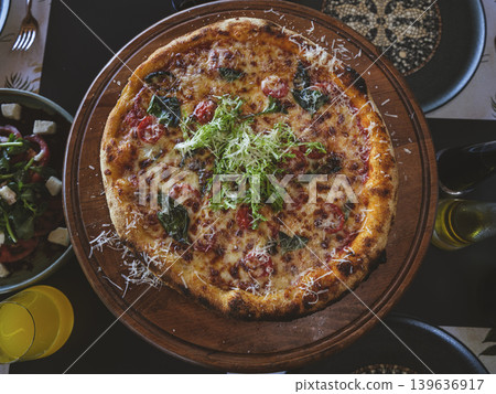 fresh Italian pizza in a restaurant fresh Italian pizza in a restaurant 139636917