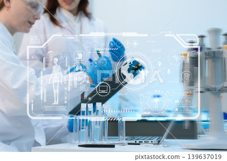 Scientist biotechnologist testing new chemical substances in a laboratory. Scientist biotechnologist testing new chemical substances in a laboratory. 139637019