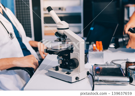 Attractive student of chemistry working in laboratory 139637659