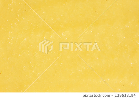 Close-up of creamy mashed apple sauce texture. Close-up of creamy mashed apple sauce texture. 139638194