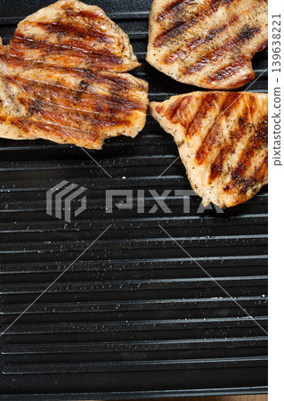 Grilled Turkey Steaks with Perfect Brown Grill Marks Close-up Grilled Turkey Steaks with Perfect Brown Grill Marks Close-up 139638221