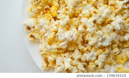 Tasty popcorn close up background top view Tasty popcorn close up background top view 139638328