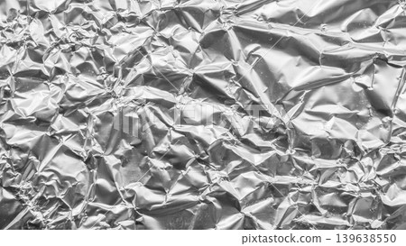 Shiny metal silver gray foil leaf crumpled texture background Shiny metal silver gray foil leaf crumpled texture background 139638550