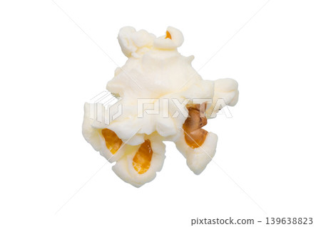 Tasty popcorn close up isolated on white background Tasty popcorn close up isolated on white background 139638823