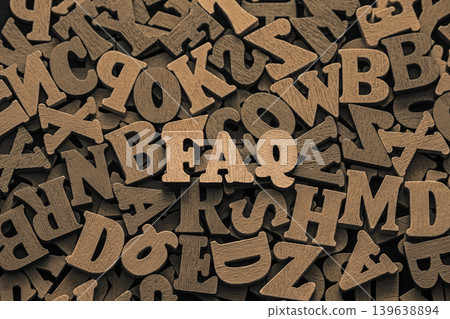 Inscription faq on pile of old vintage wooden letters. Inscription faq on pile of old vintage wooden letters. 139638894
