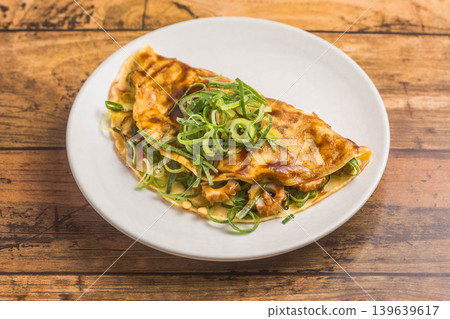 Kyoto-style green onion pancake 139639617
