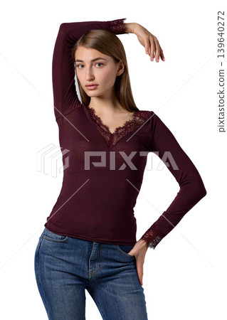 Slavic woman in burgundy lace top and jeans Slavic woman in burgundy lace top and jeans 139640272