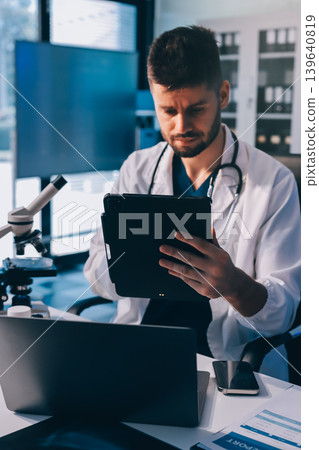 Attractive student of chemistry working in laboratory 139640819