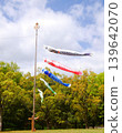 Carp streamers swimming in a park amidst fresh greenery and a blue sky | Children's Day - A typical spring scene in Japan (space for copying) 139642070