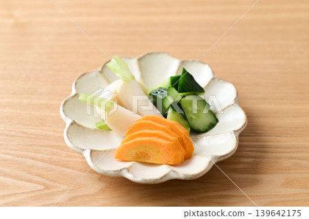 Pickled cucumbers, turnips, and carrots in rice bran Pickled cucumbers, turnips, and carrots in rice bran 139642175