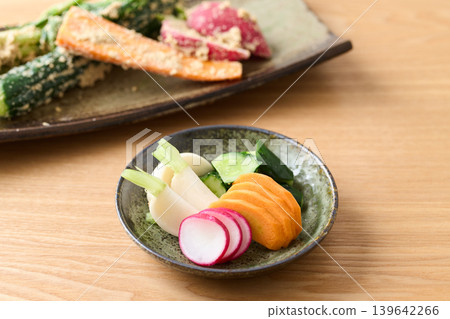 Pickled cucumbers, turnips, carrots, and radishes in rice bran Pickled cucumbers, turnips, carrots, and radishes in rice bran 139642266