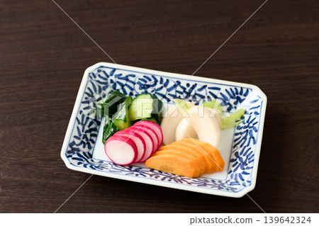 Pickled cucumbers, turnips, carrots, and radishes in rice bran Pickled cucumbers, turnips, carrots, and radishes in rice bran 139642324