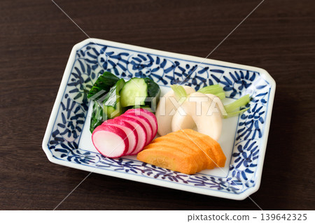Pickled cucumbers, turnips, carrots, and radishes in rice bran Pickled cucumbers, turnips, carrots, and radishes in rice bran 139642325