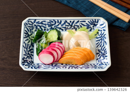 Pickled cucumbers, turnips, carrots, and radishes in rice bran Pickled cucumbers, turnips, carrots, and radishes in rice bran 139642326
