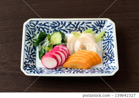 Pickled cucumbers, turnips, carrots, and radishes in rice bran Pickled cucumbers, turnips, carrots, and radishes in rice bran 139642327