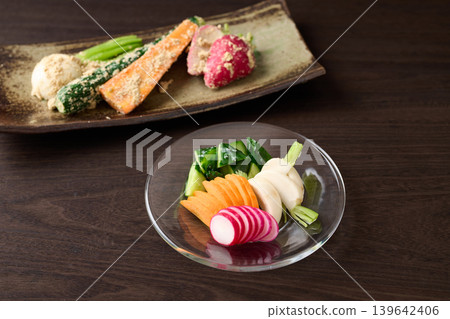 Pickled vegetables served in a glass dish Pickled vegetables served in a glass dish 139642406