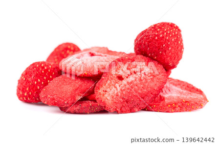 Dehydrated strawberry chips stack isolated on white background. Crispy dry strawberries slices. Dehydrated strawberry chips stack isolated on white background. Crispy dry strawberries slices. 139642442