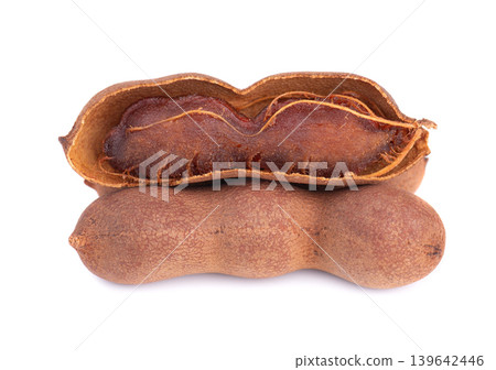 Fresh tamarind pods and open shell with pulp isolated on white background. 139642446