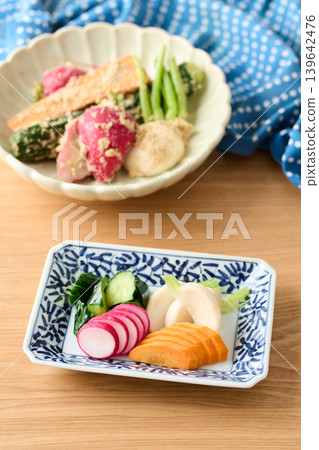 Pickled cucumbers, turnips, carrots, and radishes in rice bran Pickled cucumbers, turnips, carrots, and radishes in rice bran 139642476