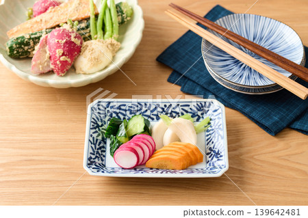 Pickled cucumbers, turnips, carrots, and radishes in rice bran Pickled cucumbers, turnips, carrots, and radishes in rice bran 139642481