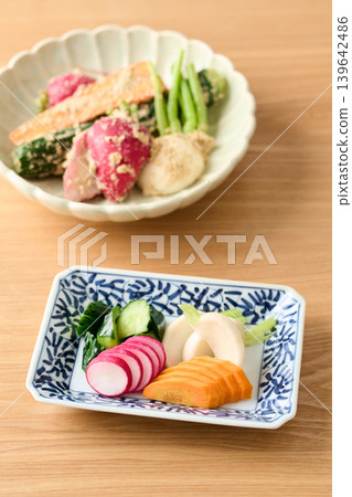 Pickled cucumbers, turnips, carrots, and radishes in rice bran Pickled cucumbers, turnips, carrots, and radishes in rice bran 139642486