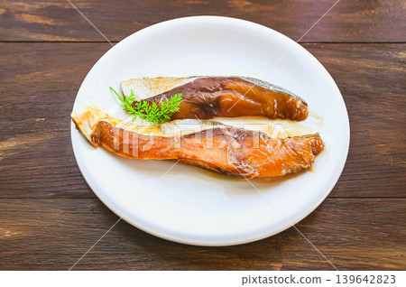 Teriyaki-flavored yellowtail in a vacuum-sealed pack Teriyaki-flavored yellowtail in a vacuum-sealed pack 139642823