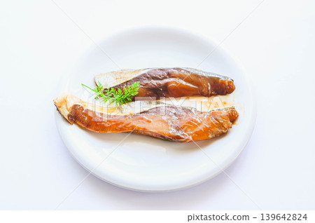Teriyaki-flavored yellowtail in a vacuum-sealed pack Teriyaki-flavored yellowtail in a vacuum-sealed pack 139642824