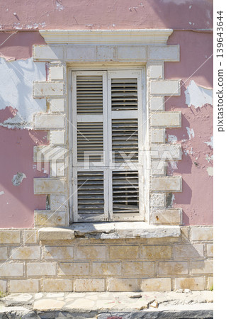 Old characteristic window in Larnaka, Cyprus Old characteristic window in Larnaka, Cyprus 139643644