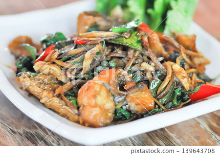 stir fried fish , stir fried bass or stir fried Sea bass fish with pepper and Chinese key or lesser ginger or spicy fish stir fried fish , stir fried bass or stir fried Sea bass fish with pepper and Chinese key or lesser ginger or spicy fish 139643708