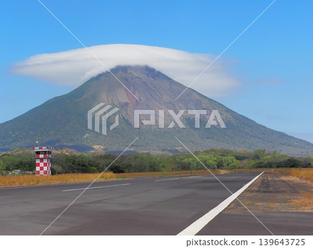 Runway and volcano on Ometepe Island, Nicaragua Runway and volcano on Ometepe Island, Nicaragua 139643725