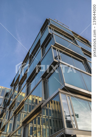 glass office building blue architecture office district glass office building blue architecture office district 139644000