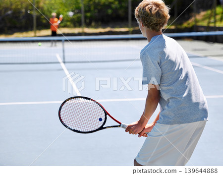 Tennis, back and person with energy, competition and performance with progress and workout. Teenager, player and athlete with racket and court with sports, serve and game with sunshine and practice 139644888