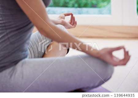 Person, hands and home meditation for peace, calm and mental health in yoga, wellness and mindfulness. Yogi relax with lotus pose for spiritual body, chakra practice or holistic wellness in a closeup 139644935