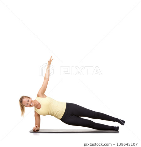 Woman, pilates and mat in studio for stretching, fitness or workout for healthy body, happy or core muscle. Person, portrait or yoga on floor for abdomen health on mockup space or white background Woman, pilates and mat in studio for stretching, fitness or workout for healthy body, happy or core muscle. Person, portrait or yoga on floor for abdomen health on mockup space or white background 139645107