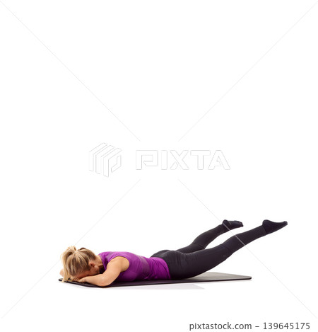 Yoga, health and floor with woman in studio for stretching, exercise and wellness. Workout, fitness and self care with female person on mat of white background for pilates, body and mockup space Yoga, health and floor with woman in studio for stretching, exercise and wellness. Workout, fitness and self care with female person on mat of white background for pilates, body and mockup space 139645175