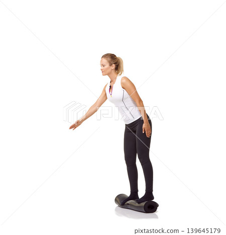 Woman, exercise and mat in studio for workout, pilates or fitness for healthy body, wellness or balance. Person, face and yoga in sportswear for physical activity on mock up space or white background Woman, exercise and mat in studio for workout, pilates or fitness for healthy body, wellness or balance. Person, face and yoga in sportswear for physical activity on mock up space or white background 139645179