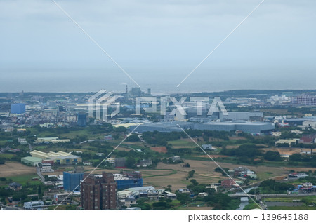 Looking from airplane of the Taipei city view, Taiwan. Ariel view of Taipei cityscape. Stunning nature and cityscape. Travel concept. Looking from airplane of the Taipei city view, Taiwan. Ariel view of Taipei cityscape. Stunning nature and cityscape. Travel concept. 139645188