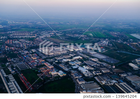 Looking from airplane of the Taipei city view, Taiwan. Ariel view of Taipei cityscape. Stunning nature and cityscape. Travel concept. Looking from airplane of the Taipei city view, Taiwan. Ariel view of Taipei cityscape. Stunning nature and cityscape. Travel concept. 139645204