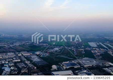 Looking from airplane of the Taipei city view, Taiwan. Ariel view of Taipei cityscape. Stunning nature and cityscape. Travel concept. Looking from airplane of the Taipei city view, Taiwan. Ariel view of Taipei cityscape. Stunning nature and cityscape. Travel concept. 139645205