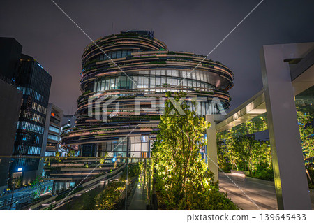 Exterior view of MoN Takanawa (Cultural Creation Building) and night view from the pedestrian deck [Minato Ward, Tokyo] 139645433