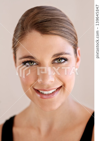 Portrait, beauty and happy woman in makeup for skincare in studio isolated on a brown background. Face, person and young model in cosmetics, healthy skin glow and spa facial treatment dermatology Portrait, beauty and happy woman in makeup for skincare in studio isolated on a brown background. Face, person and young model in cosmetics, healthy skin glow and spa facial treatment dermatology 139645847