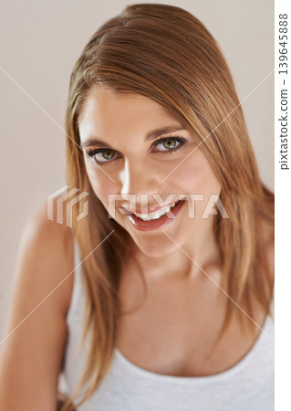 Makeup, smile and portrait of young woman with natural, glow and beauty facial routine. Confident, cosmetics and happy attractive female person with self care, dermatology and face treatment. Makeup, smile and portrait of young woman with natural, glow and beauty facial routine. Confident, cosmetics and happy attractive female person with self care, dermatology and face treatment. 139645888