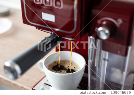 Preparing ground coffee for espresso machine at home Preparing ground coffee for espresso machine at home 139646659