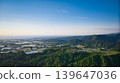 View of the area around Toyama Bay from the hills in the evening. 139647036
