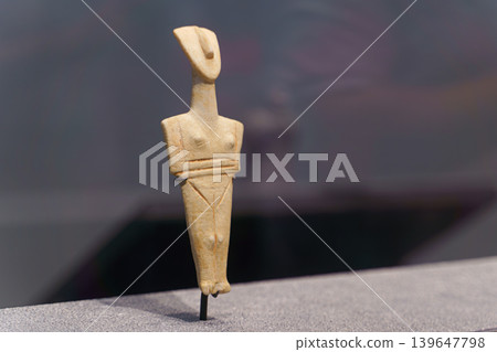 Abu Dhabi, United Arab Emirates - Jan 17 2024, close up view of the ancient statue of the deity, on exhibition of Louvre Abu Dhabi museum, Abu Dhabi, UAE Abu Dhabi, United Arab Emirates - Jan 17 2024, close up view of the ancient statue of the deity, on exhibition of Louvre Abu Dhabi museum, Abu Dhabi, UAE 139647798