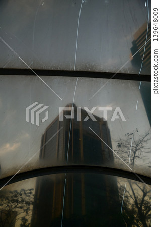 The scene of skyscapers of Hong Kong from low angle view from the tunnel. Hong Kong cityscape. Modern Buildings. Building exterior. Travel concept. The scene of skyscapers of Hong Kong from low angle view from the tunnel. Hong Kong cityscape. Modern Buildings. Building exterior. Travel concept. 139648009
