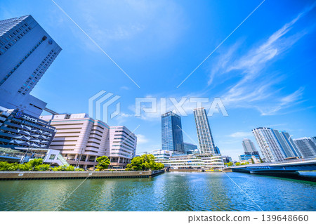 Yokohama cityscape, Japan: North East Exit side of Yokohama Station. View of Yokohama Bay Quarter, Sogo Yokohama Department Store, Sky Building, and more. Yokohama cityscape, Japan: North East Exit side of Yokohama Station. View of Yokohama Bay Quarter, Sogo Yokohama Department Store, Sky Building, and more. 139648660