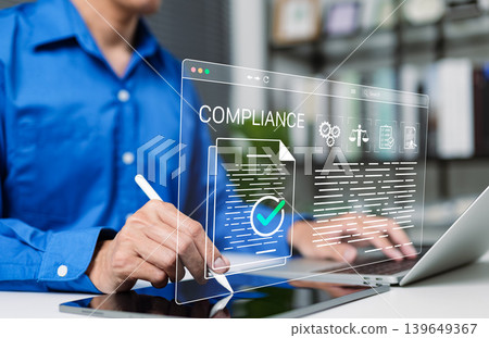 Compliance document approval and regulatory audit workflow concept. Businessman using laptop with verified, checkmark, legal icon, checklist, policy review, quality control, certificate, certification 139649367