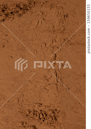 Artisan cocoa powder background for healthy dessert concept Artisan cocoa powder background for healthy dessert concept 139650155