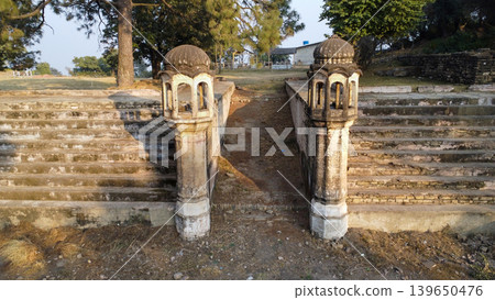 Tilla jogian mountaintop water pond commissioned by emperor akbar for jogis now dry with arched structures 139650476